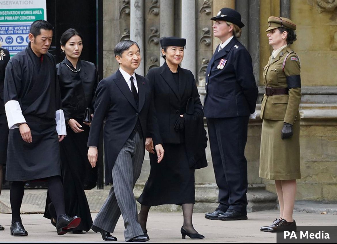 Pictured: March on Stress Operations Manager and FANY(PRVC) volunteer Zoé Brooke, in green uniform, at the door of Westminster Abbey